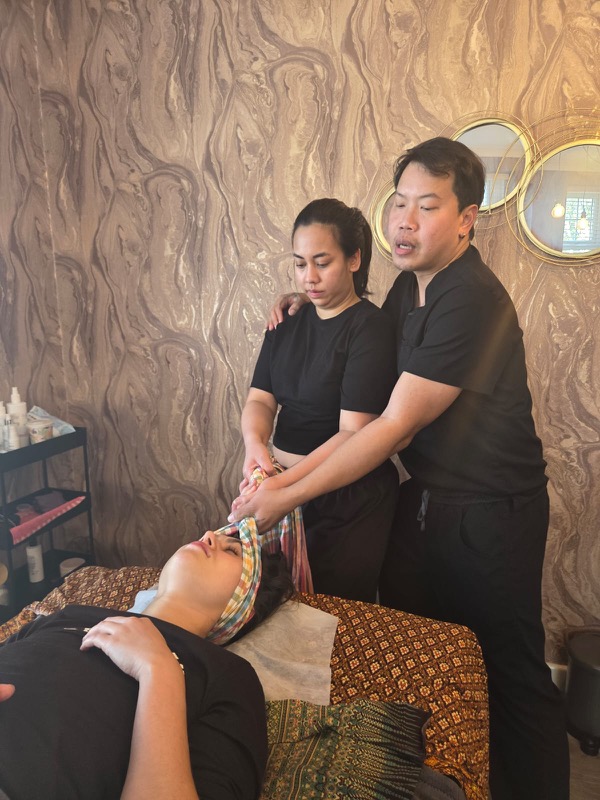 Hands-on massage teaching session